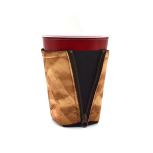 Brown Paper Bag ZipSip drink sleeve on red solo cup