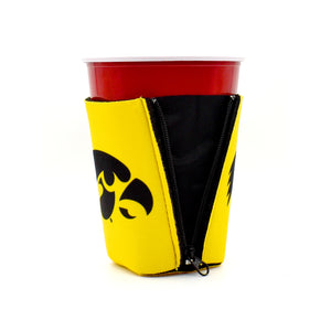 University of Iowa Yellow ZipSip drink sleeve on red solo cup