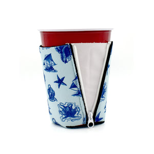 Vintage Sea ZipSip drink sleeve on red solo cup