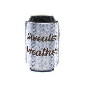 Knit pattern with sweater weather text on a black can