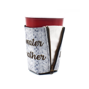 Knit pattern with sweater weather text on solo cup